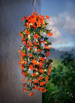 Solární závěsná dekorace magické květy, oranžová